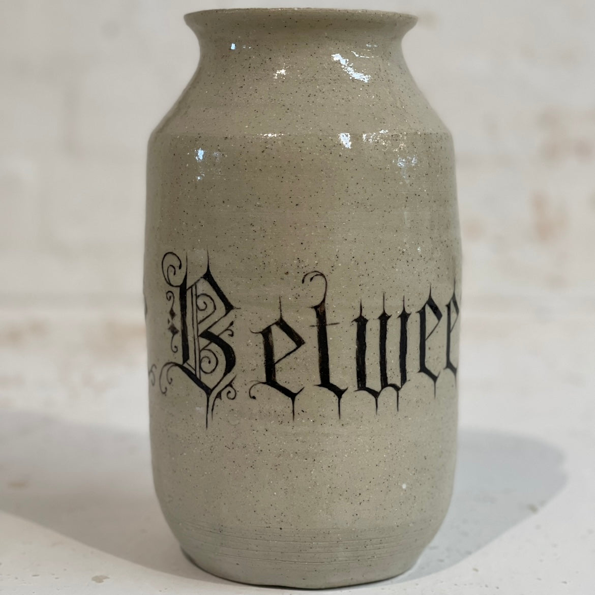 BETWEEN THE DIVINE VASE